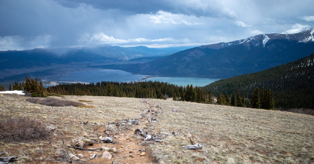 Twin Lakes below Mount Elbert's East Ridge beneath dark clouds
