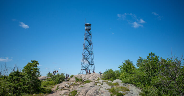 Beacon Fire Tower above the rocky summit of South Beacon Mountain