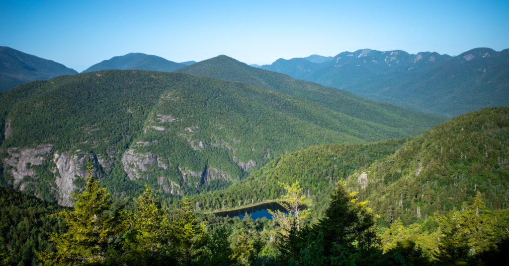Giant Washbowl below forested cliffs, seen from the Ridge Trail.